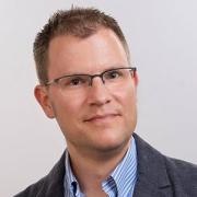 Justin Remais headshot